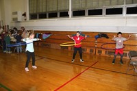 students hula hooping