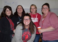 five teachers smiling