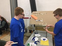 high school students taking part in engineering day event