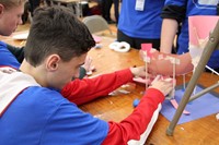 high school students taking part in engineering day event