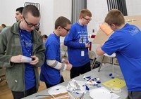 high school students taking part in engineering day event