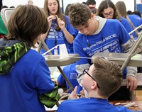 high school students taking part in engineering day event