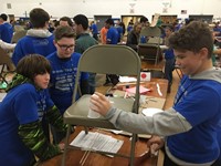 high school students taking part in engineering day event