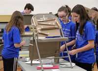 middle school students taking part in engineering day activity