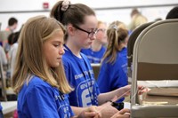 middle school students taking part in engineering day activity