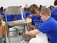 middle school students taking part in engineering day activity