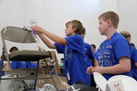 middle school students taking part in engineering day activity