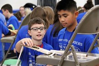 middle school students taking part in engineering day activity