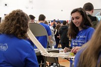 middle school students taking part in engineering day activity