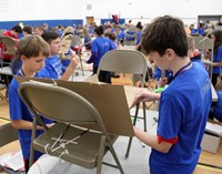 middle school students taking part in engineering day activity