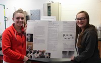 two students with their project