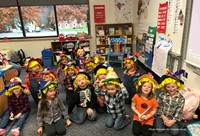pre k students wearing scarecrow hats