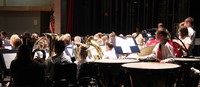 medium shot of seventh and eighth grade band students performing
