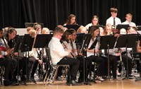 medium shot of sixth grade band performing