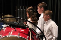 students playing percussion instruments