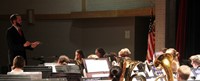 medium shot of seventh and eighth grade band performing