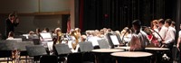 seventh and eighth grade band members performing 