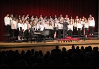 seventh and eighth grade chorus members singing