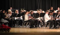 medium shot of sixth grade band students performing