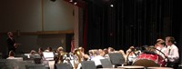 seventh and eighth grade band students performing