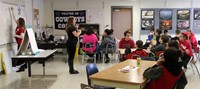 close shot of nutrition presenter speaking with students