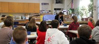 wide shot of presenters giving nutrition presentation