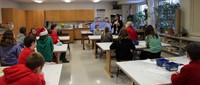 wide shot of students taking part in art project