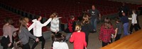 students with cayman the therapy dog