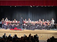 students playing instruments in winter concert