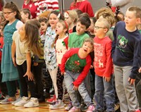 students dancing and singing