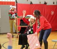 teachers taking part in activity at holiday sing along