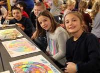 students smiling at friendship feast