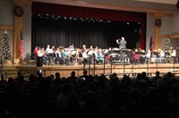 wide shot of band performing in winter concert
