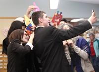high school students taking selfie with monster creations