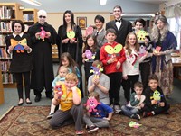 group holding up the monster crafts they created