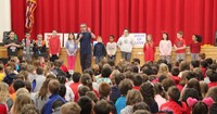 presenter speaking with students