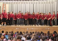 high school students performing on stage