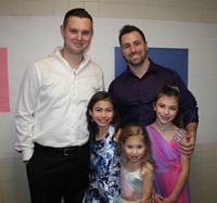 group of five people at p t a winter dance