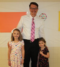 three people smiling at dance