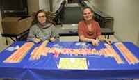 volunteers with glow sticks