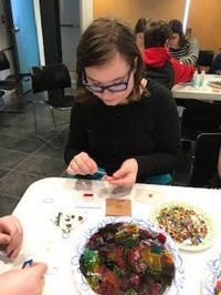 student working on glass project