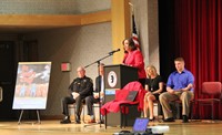 medium shot of principal ostrander speaking at law enforcement official speaking at no empty chair c