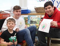 students with books, drawings and sewn monsters 9