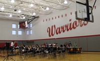 wide shot of high school band students performing