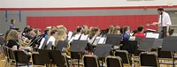 middle school band students performing