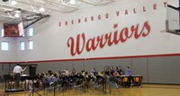 wide shot of middle school band students performing