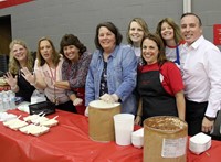 chenango valley staff members helping with ice cream social