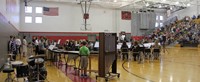 wide shot of middle school band students performing