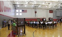 wide shot of middle school band students performing