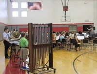 middle school band students performing